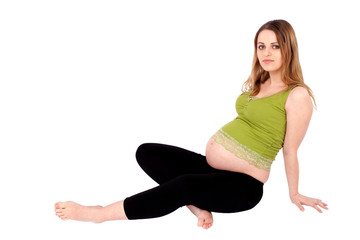 Fototapeta premium Pregnant Woman Sitting on the Ground