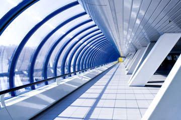 Diminishing hall inside airport in cosmic style