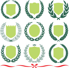 Vector shields and laurel wreaths set