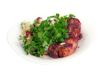 Pork ribs in cranberry sauce with potato and parsley