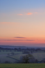 View over English countryside at sunset