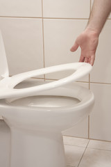 Lifting up toilet seat