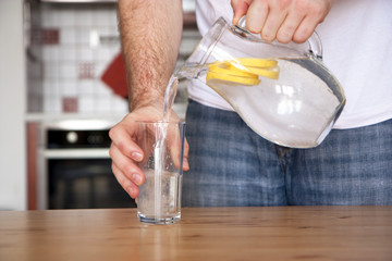 Man pouring out a water