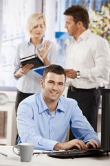 Office life - businessman working at desk