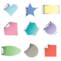 Different shapes of colored stickers in pastel tones