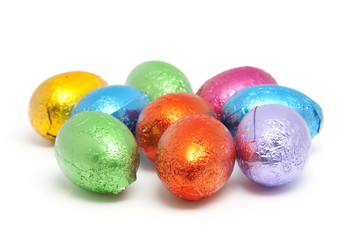 chocolate easter eggs over white background