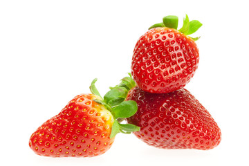 juicy strawberries isolated on white