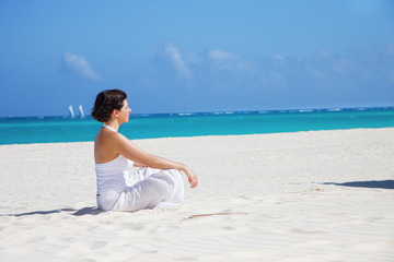Fototapeta na wymiar meditation on the beach