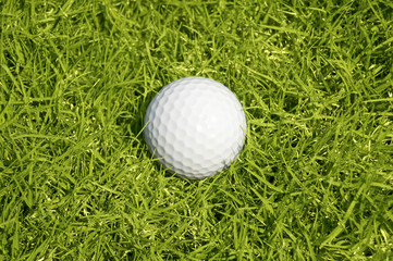 golf ball on green grass