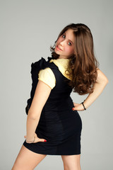 Fototapeta premium A pretty young woman in blue dress.