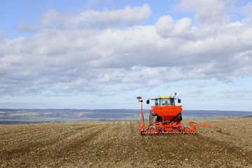 Fototapeta premium sowing spring barley on the yorkshire wolds
