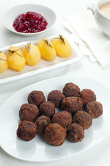Swedish Kottbullar meatball with brunas sauce, boiled potatoes