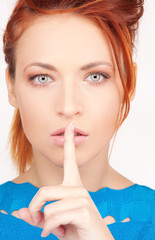 Fototapeta premium finger on lips
