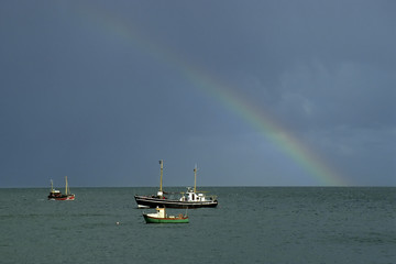Rainbow and fishing boats