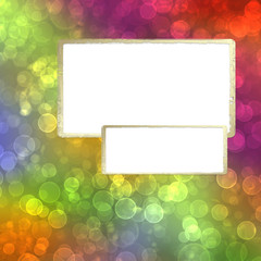 Gold frame on the multicolored background with blur bokeh