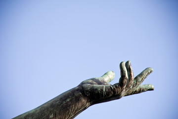 Hand of a bronze statue