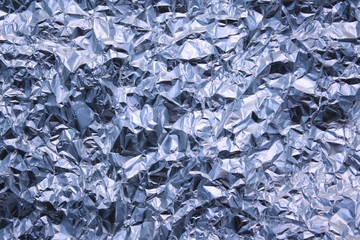 Foil background in blue light