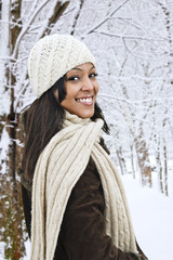 Happy woman outside in winter