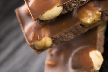 Pile of broken chocolate with nuts