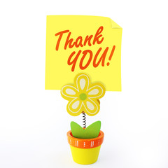 Flower note holder with yellow stick note saying thank you