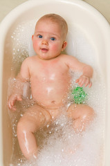 A splashing baby-girl