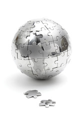 Metal puzzle globe isolated on white background