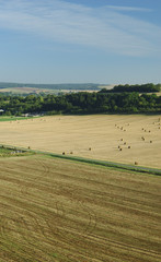 Obraz premium Aerial of harvest fields in summertime, France
