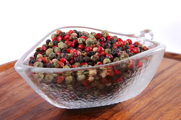 dry pepper over white