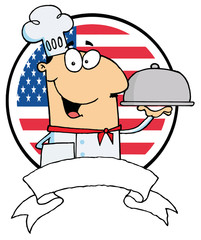Male Chef Serving Food In A Sliver Platter In Front Of Flag