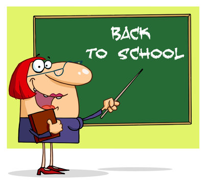 Female Teacher Pointing To A Back To School Chalkboard