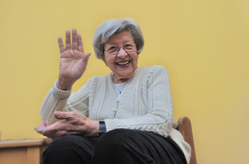 Senior Woman Waving Hand 2