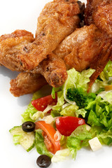 Chicken legs with fresh vegetables