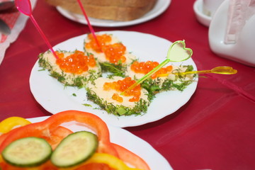 Sandwiches with red roe