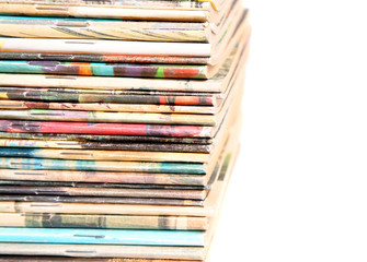Background with a pile magazines.
