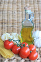 Olive oil with tomatoes, garlic and pasta