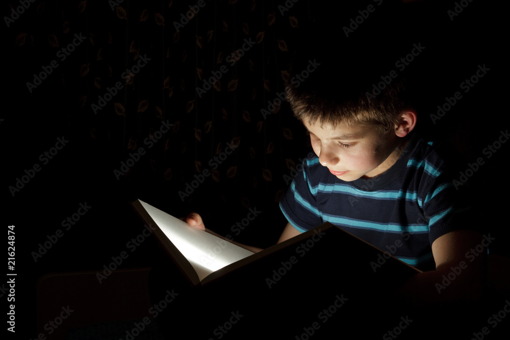 Wall mural boy reading bedtime story