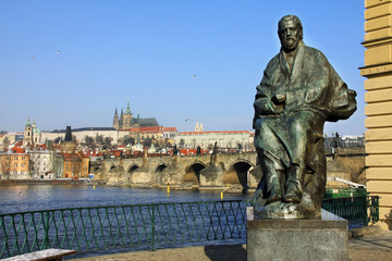 Fototapeta na wymiar Prague gothic Castle with the Statue of big czech Compositor