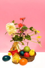 Obraz na płótnie Canvas Still Life With Easter Eggs And Flowers