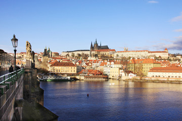 Fototapeta na wymiar The colorful Prague gothic Castle with the Charles Bridge