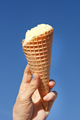 ice-cream in the hand.