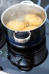 potato boiling in water