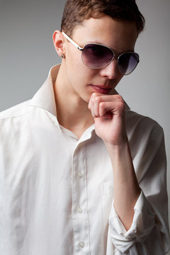 pensive young man in shirt