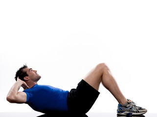 Obraz premium man on Abdominals workout posture on white background