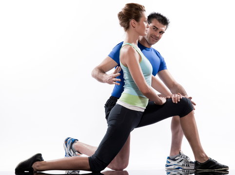 stretching workout posture by a couple on studio