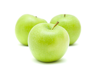three green apples isolated on white background