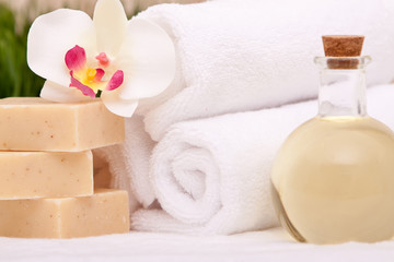 Fototapeta na wymiar Spa towels and aromatherapy oils