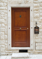 Frontdoor with post box.