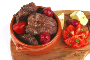 beef meat in pot with vegetables