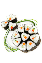 served shushi rolls on white