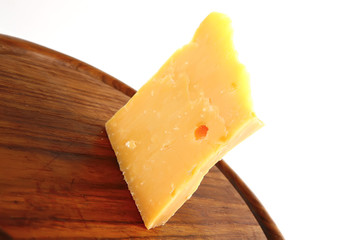 edam cheese on wood
